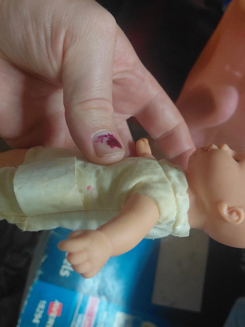 a vintage 1997 Corolle mini baby doll featuring blue eyes and a soft body.